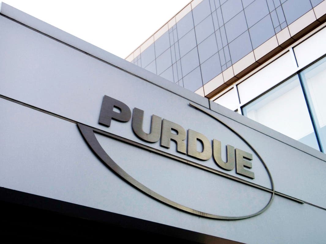 Proposed settlements between the federal government and OxyContin maker Purdue Pharma and its owners have cleared a major legal hurdle. 