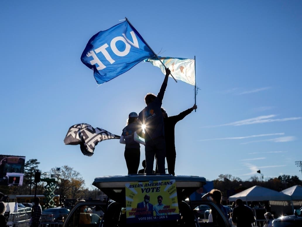 Supporters wait for Vice President-elect Kamala Harris attend a drive-in rally in Savannah during a campaign stop for Democratic U.S. Senate challengers the Rev. Raphael Warnock and Jon Ossoff on Sunday, Jan. 3.