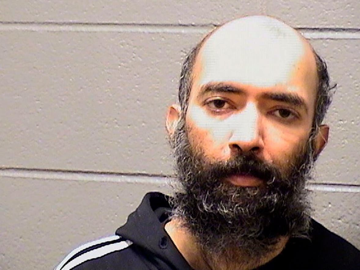 This Saturday, Jan. 16, 2021, booking photo shows Aditya Singh. Singh, of California, who was arrested on charges that he hid in a secured area at Chicago's O'Hare International Airport for three months. 