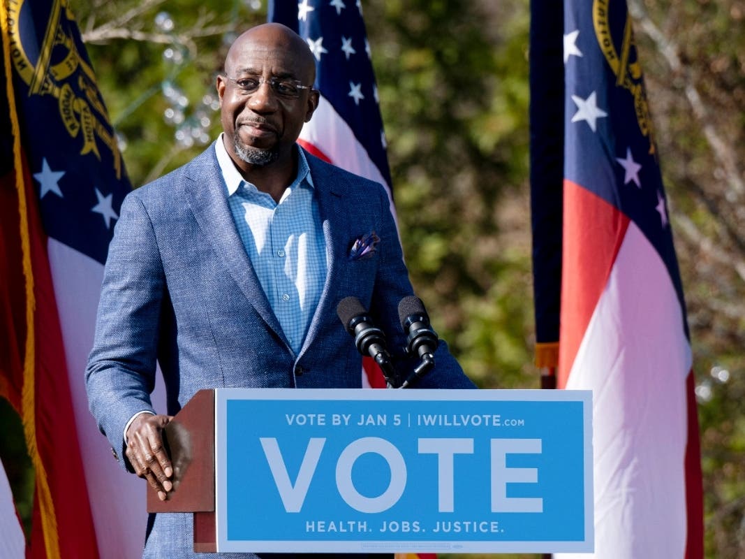 Democratic U.S. Senator-elect Raphael Warnock speaks during a rally on Dec. 21 in Columbus, Ga.