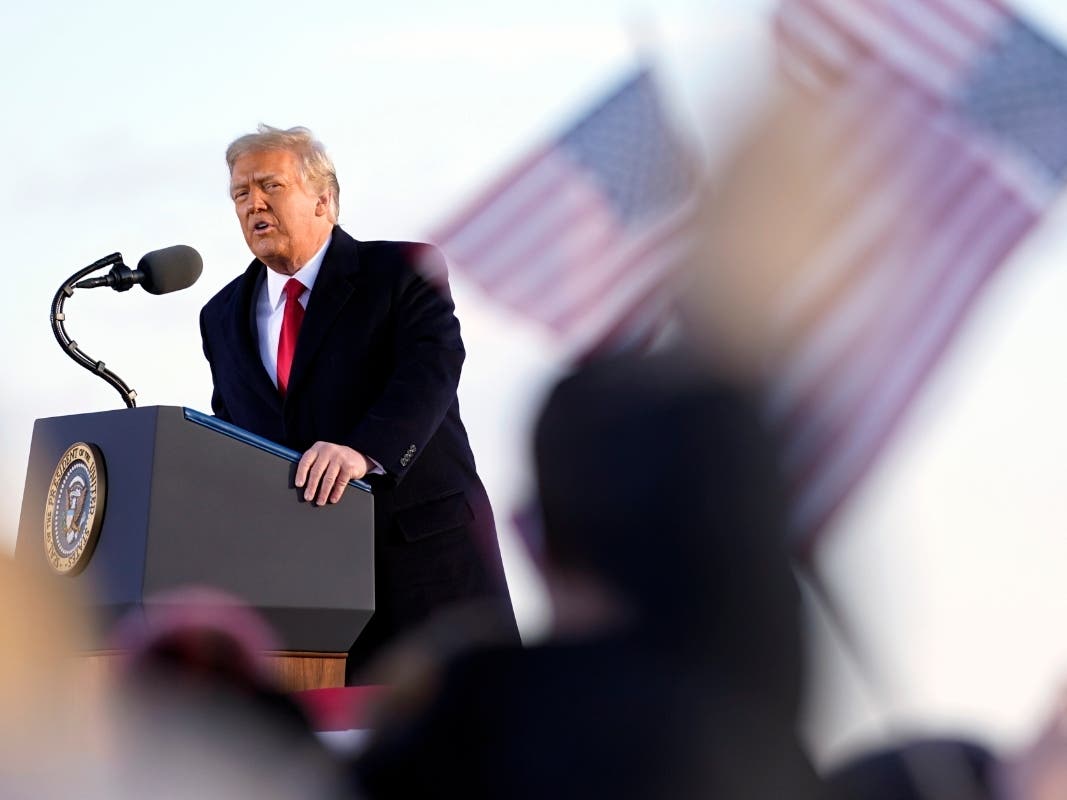 President Donald Trump speaks Wednesday before boarding Air Force One at Andrews Air Force Base, Md.