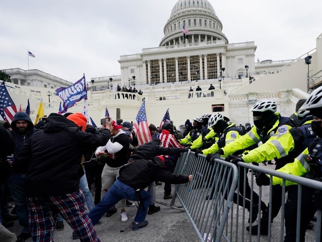Right-wing extremism has previously mostly played out in isolated pockets of America or in smaller cities, but the Jan. 6 Capitol insurrection targeted the very heart of government, allowing disparate groups  to establish links with each other.
