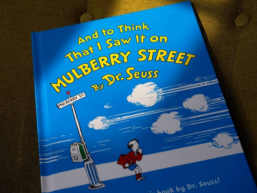 A copy of the book "And to Think That I Saw It on Mulberry Street," by Dr. Seuss, rests in a chair, Monday in Walpole. 