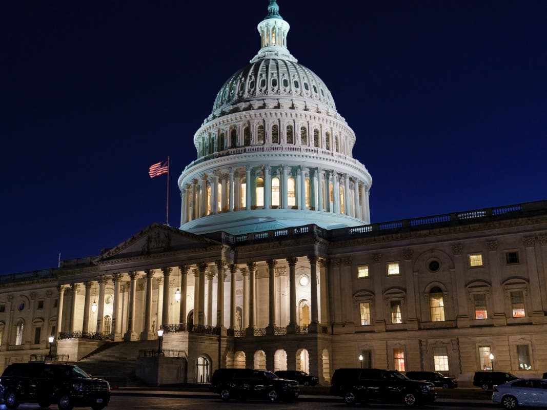 The Capitol is seen at dusk as work in the Senate is stalled on the Democrats' $1.9 trillion COVID-19 relief bill in Washington.