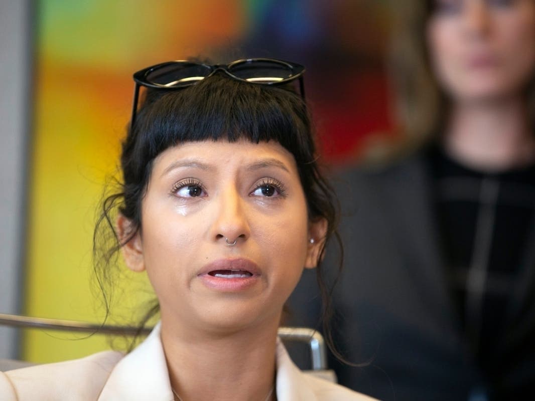 Ashley Solis, the first woman to file sexual assault claims against Houston Texans quarterback Deshaun Watson, gives a statement during a news conference, Tuesday, April 6, 2021, in Houston.