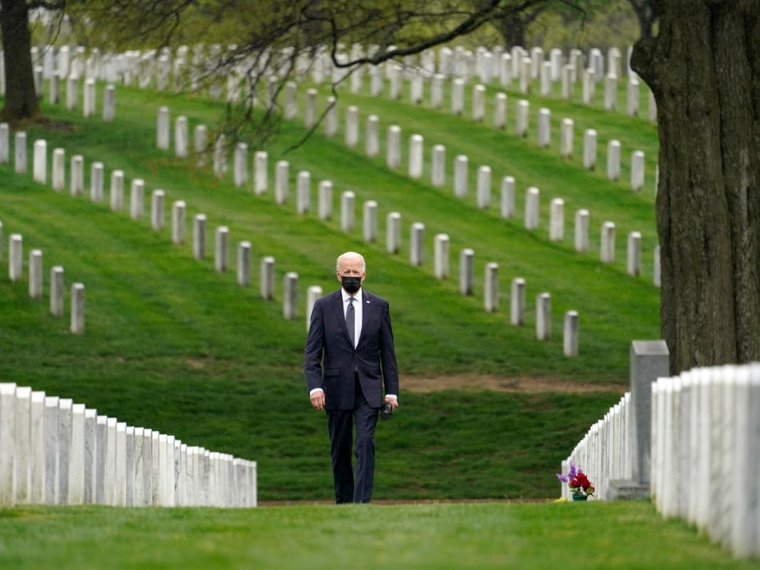 President Joe Biden visits Section 60 of Arlington National Cemetery in Arlington, Va., on Wednesday.