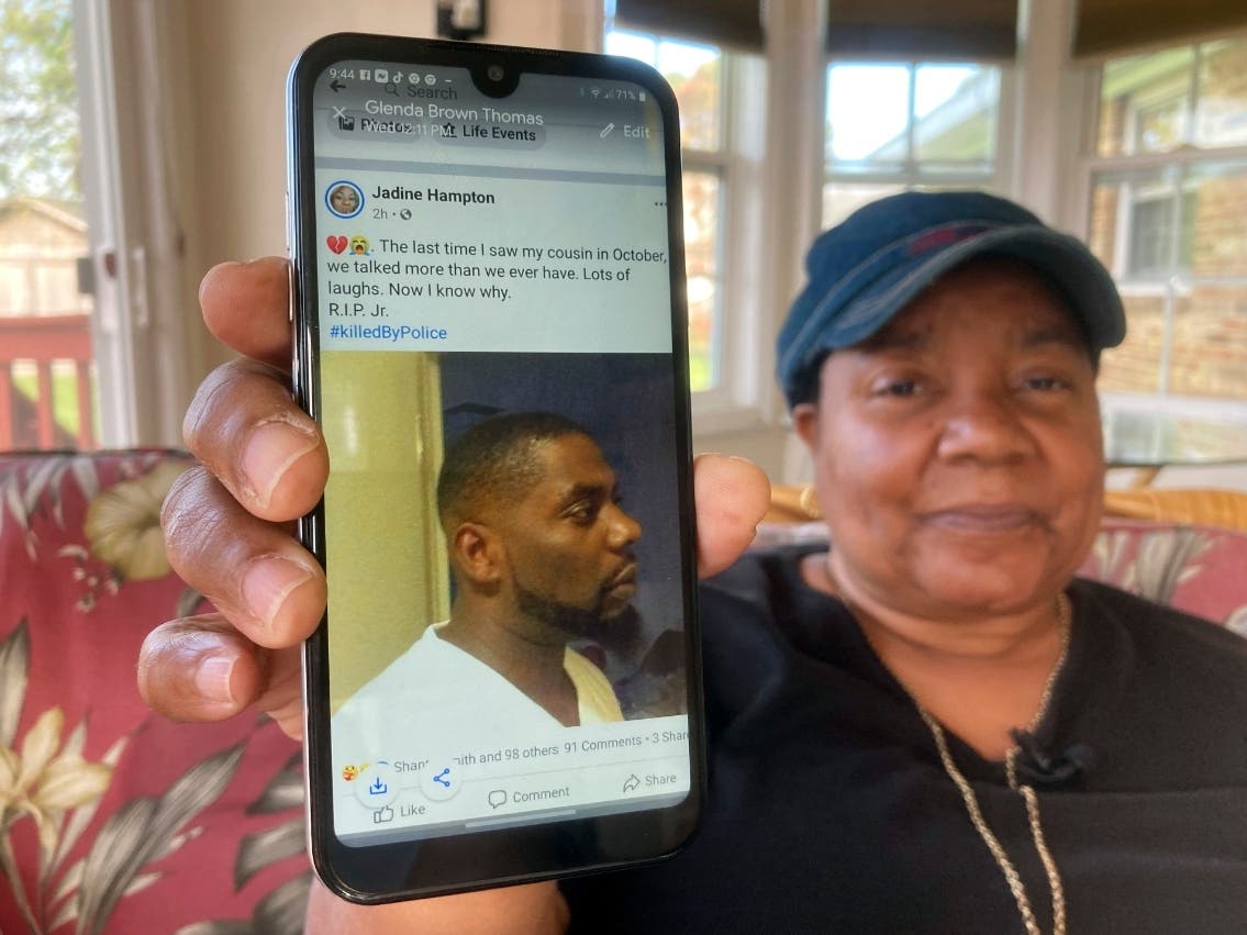 Glenda Brown Thomas displays a photo of her nephew, Andrew Brown Jr., on her cell phone at her home in Elizabeth City, N.C., on Thursday, April 22, 2021. Brown was shot and killed Wednesday by a sheriff's deputy, who was attempting to execute a warrant. 