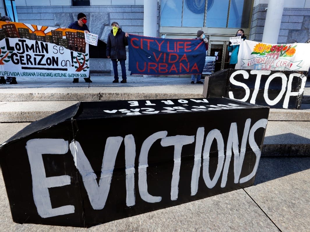 Tenants' rights advocates demonstrate in front of the Edward W. Brooke Courthouse in Boston in January.