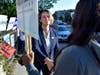 Mayoral Candidate City Councilor Annissa Essaibi George greets campaigners outside a polling place in the Roxbury neighborhood of Boston on Tuesday.