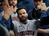 Houston Astros' Jose Altuve celebrates scoring against the Chicago White Sox in the eighth inning during Game 4 of the American League Division Series on Tuesday in Chicago.