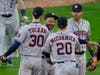 Houston Astros' Jose Altuve (center) celebrates with Kyle Tucker (left), Chas McCormick (second from right) and Carlos Correa after beating the Chicago White Sox 10-1 in Game 4 of the American League Division Series Tuesday in Chicago.