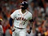 Houston Astros' Carlos Correa celebrates a home run against the Boston Red Sox during the seventh inning in Game 1 of baseball's American League Championship Series on Friday in Houston.
