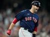 Boston Red Sox's J.D. Martinez celebrates his grand slam against the Houston Astros during the first inning in Game 2 of baseball's American League Championship Series Saturday in Houston.