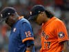 Houston Astros starting pitcher Luis Garcia leaves the games with manager Dusty Baker Jr. against the Boston Red Sox during the second inning in Game 2 of baseball's American League Championship Series Saturday in Houston.