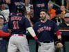 Boston Red Sox's Rafael Devers celebrates after a grand slam home run with J.D. Martinez against the Houston Astros during the second inning in Game 2 of baseball's American League Championship Series Saturday in Houston. 