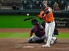 Houston Astros' Yuli Gurriel hits a home run against the Boston Red Sox during the ninth inning in Game 2 of baseball's American League Championship Series Saturday in Houston.