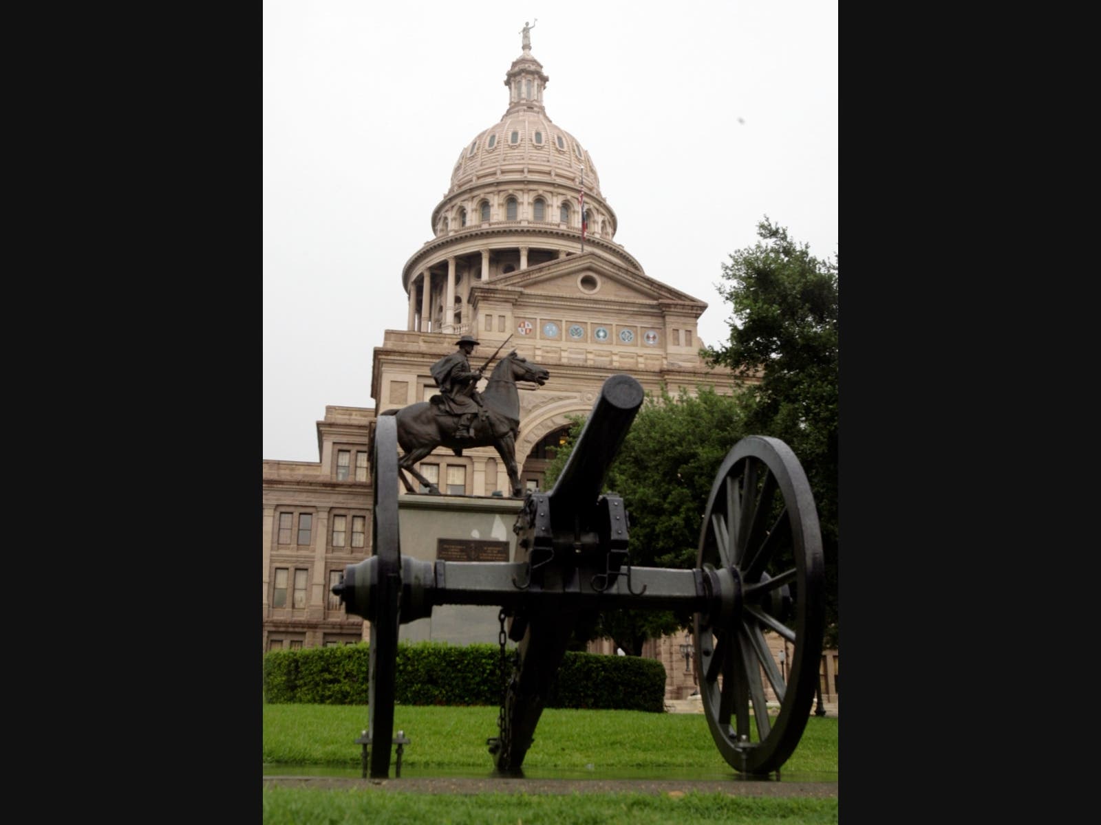 FILE - In this Tuesday, June 30, 2009 file photo, The south side of the Capitol and its surrounding grounds are shown in Austin, Texas. Texas Republicans are set to approve redrawn U.S. House maps that would shore up their eroding dominance.