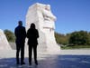 President Joe Biden and Vice President Kamala Harris stand together at the Martin Luther King, Jr. Memorial as they arrive to attend an event marking the 10th anniversary of the dedication of memorial in Washington, D.C., on Thursday.