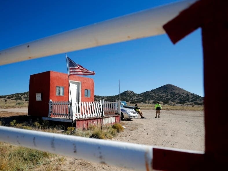 Private security stand at the entrance of the Bonanza Creek Film Ranch in Santa Fe/ Actor Alec Baldwin fired a prop gun on the set of a Western being filmed at the ranch on Thursday, killing the cinematographer, officials said.