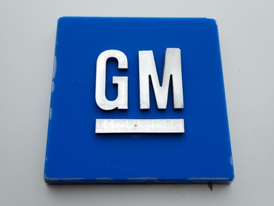 This Jan. 27, 2020 photo shows the General Motors logo. High prices for trucks and SUVs helped General Motors post a $2.4 billion third-quarter profit despite factory closures due to a shortage of computer chips and other parts.