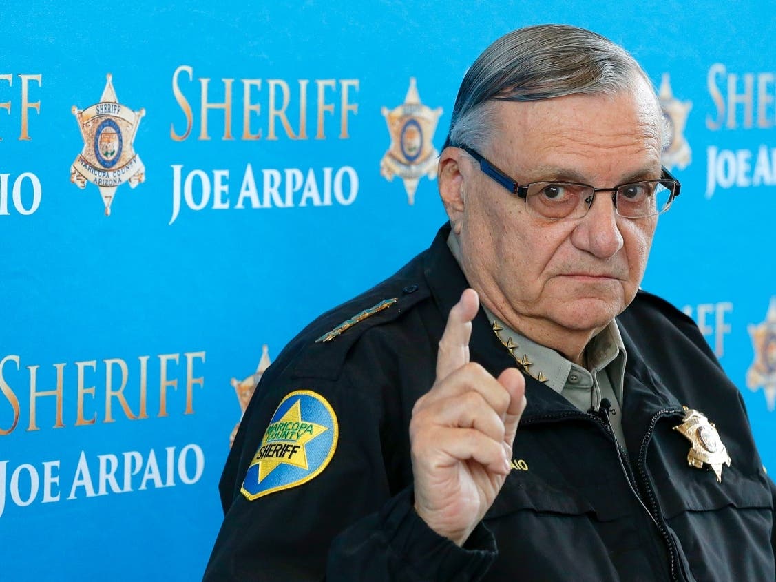 In this 2013 file photo, then-Maricopa County Sheriff Joe Arpaio pauses as he answers a question at a news conference at Maricopa County Sheriff's Office Headquarters in Phoenix.