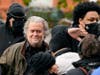 ​Former White House strategist Steve Bannon arrives at the FBI field office in Washington, D.C., Monday before surrendering himself to federal authorities on contempt of Congress charges. Bannon defied a House panel's subpoena in th Jan. 6 Capitol riot.