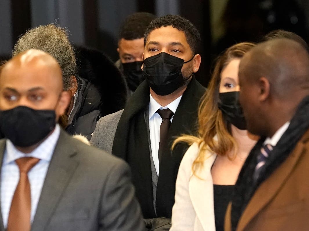 Actor Jussie Smollett, center, arriving at the Leighton Criminal Courthouse on Thursday.