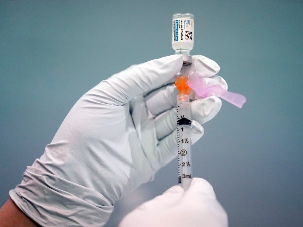 The U.S. COVID-19 death toll stood at about 350,000 as 2021 began, a time when the country was in the throes of a winter surge so bad patients were lined up in emergency room hallways waiting for beds. Vaccines offered promise as the delta variant surged.