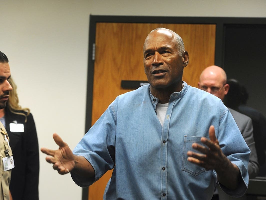 Former NFL football star O.J. Simpson reacts after learning he was granted parole at the Lovelock Correctional Center in Lovelock, Nev., on July 20, 2017. 