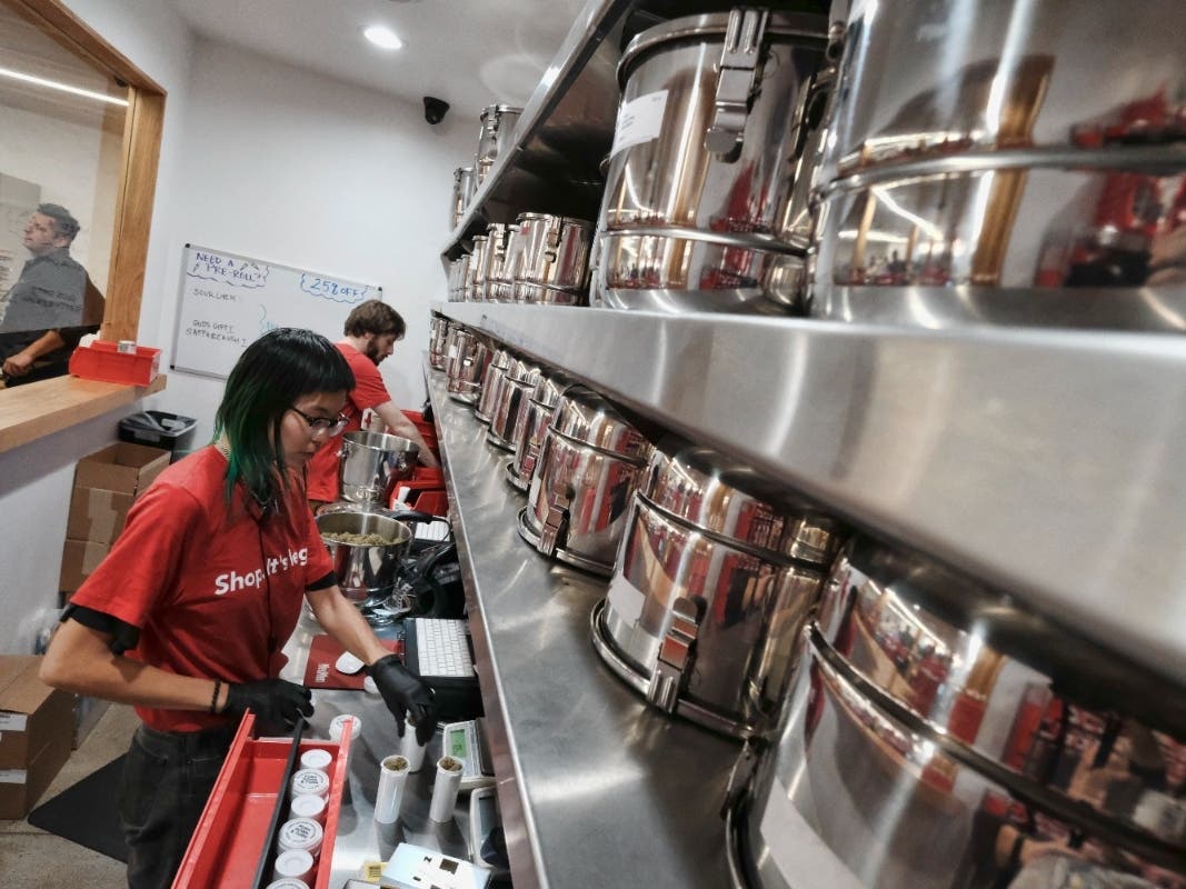 In this Jan. 12, 2018, file photo, a bud tender prepares marijuana for a customer at Med Men a dispensary in West Hollywood, Calif.