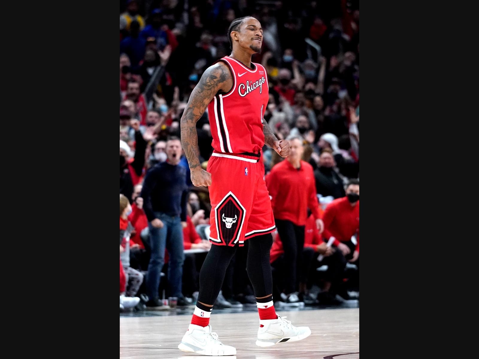 Bulls forward DeMar DeRozan reacts after scoring a basket on Sunday in Chicago.