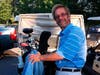 In this photo provided by Bob Van Wert, Tom Randele, whose real name according to authorities is Ted Conrad, tends to golf clubs, in September 2012, in Ayer, Mass. Conrad, a former Ohio bank teller-turned-thief, lived for decades under a different name.