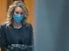 Elizabeth Holmes walks into federal court in San Jose, Calif., Monday, Jan. 3, 2022. 