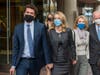 Elizabeth Holmes, center, leaves federal court in San Jose, Calif., Monday, Jan. 3, 2022. 
