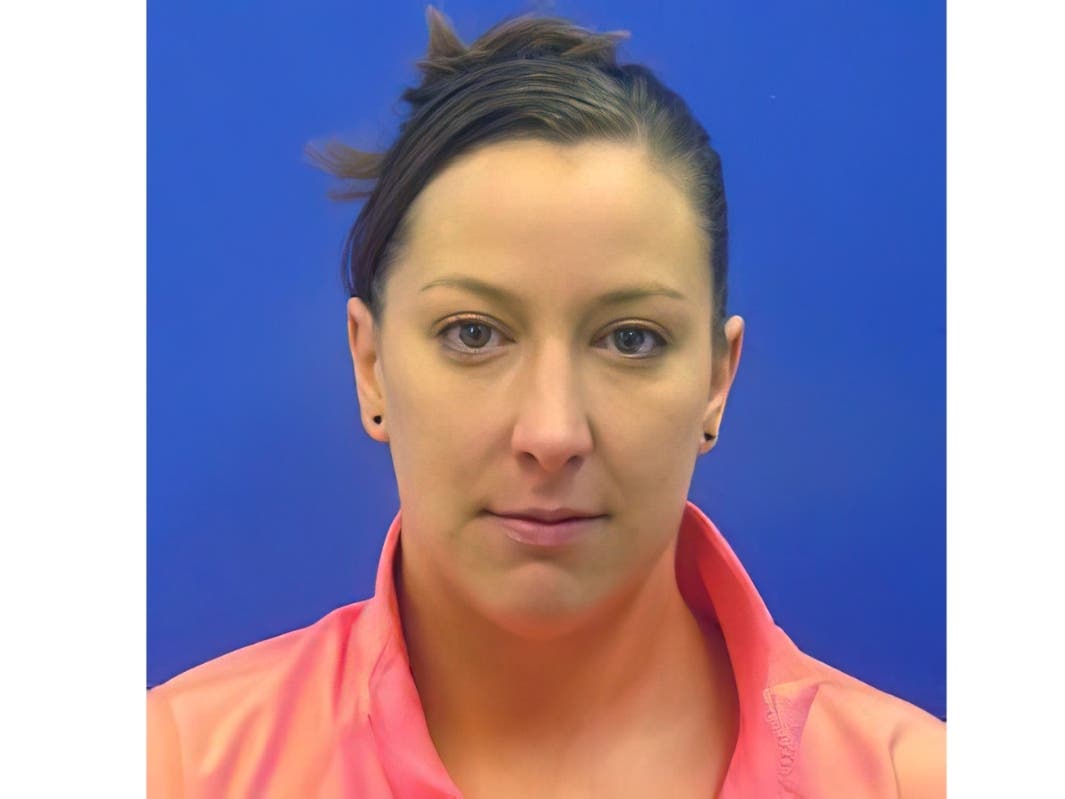 This driver's license photo from the Maryland Motor Vehicle Administration (MVA), provided to AP by the Calvert County Sheriff's Office, shows Ashli Babbitt. 