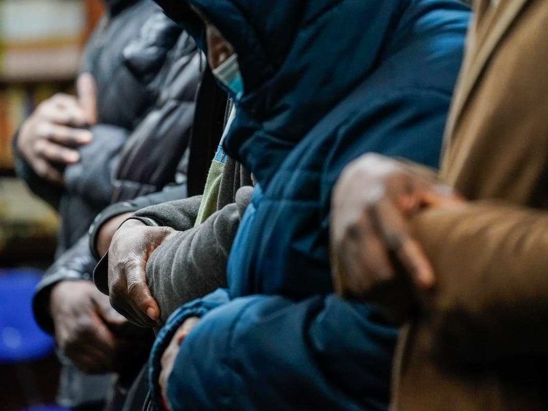 Members of the Masjid Ar Rahman pray, in the Bronx borough of New York, Wednesday, Jan. 12, 2022. The Mosque is a place of worship for some of the residents of the building which suffered the New York City's deadliest fire in three decades.