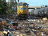 Shredded boxes and packages are seen at a section of the Union Pacific train tracks in downtown Los Angeles Friday, Jan. 14, 2022.