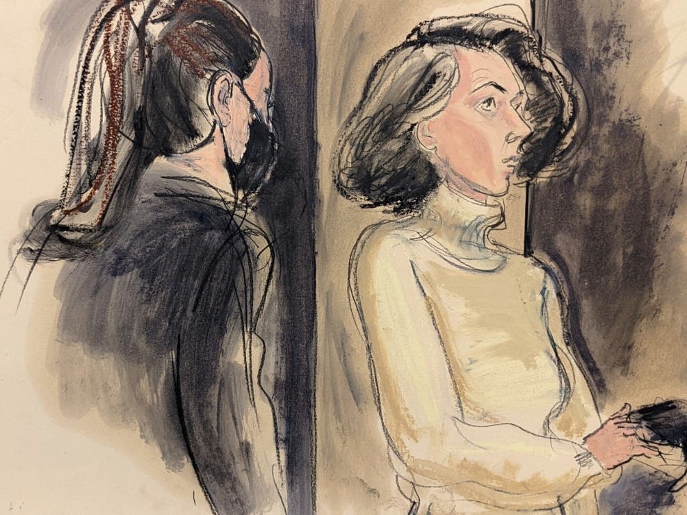 In this courtroom sketch, Ghislaine Maxwell, right, sits with her mask off during a break in her sex trafficking trial, Monday, Dec. 20, 2021, in New York. 