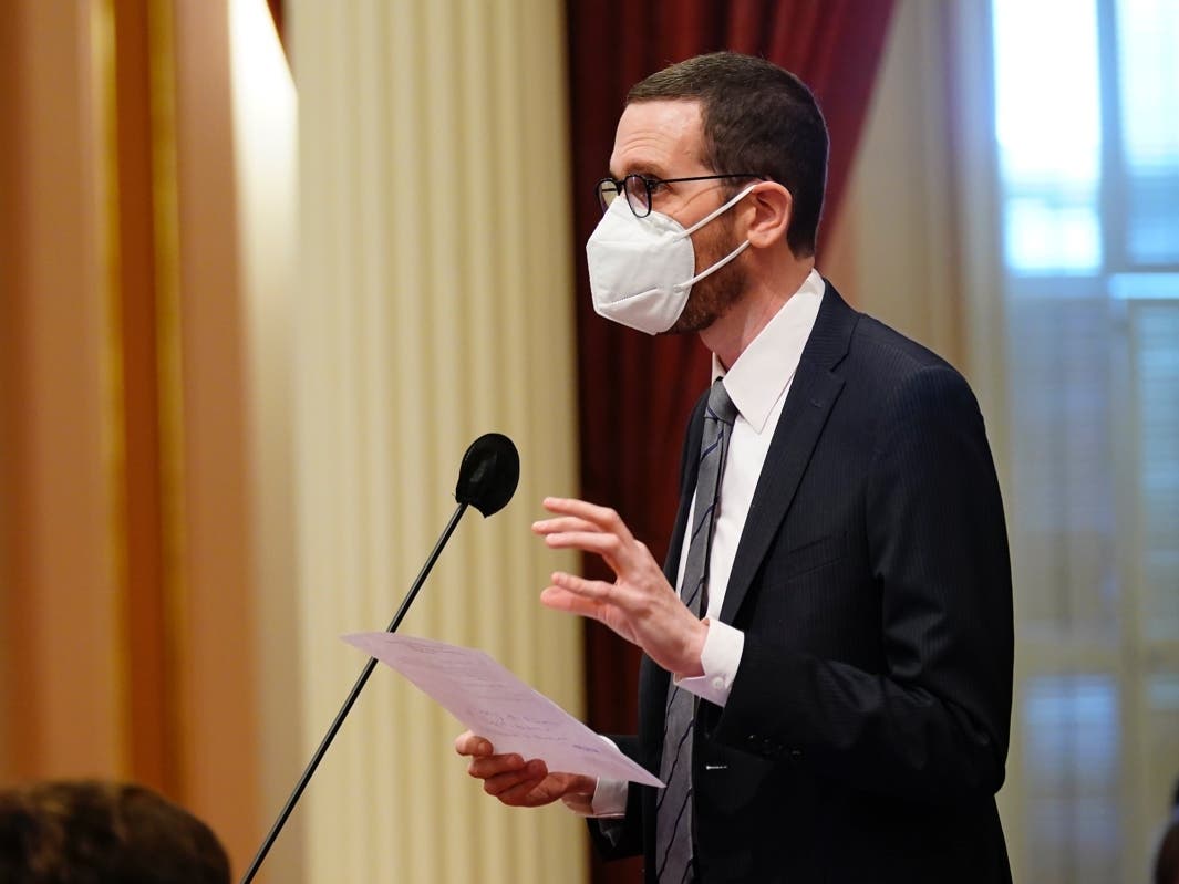 State Sen. Scott Wiener, D-San Francisco, addresses the state Senate at the Capitol in Sacramento, Calif., Tuesday, Jan. 18, 2022. Wiener is introducing a bill that would allow children ages 12 and up to be vaccinated without their parents' consent.