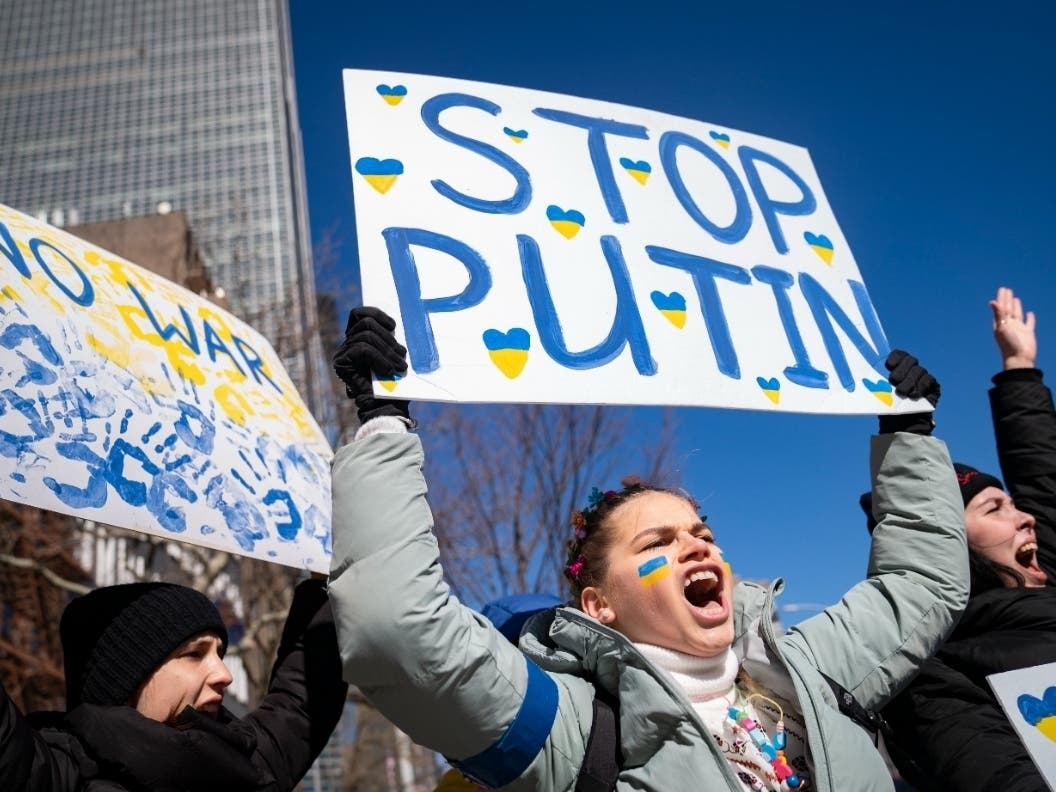 Pro-Ukraine demonstrators gather outside the United Nations during an emergency meeting of the U.N. General Assembly in New York Monday, where the 193-nation General Assembly and 15-member Security Council held meetings on Russia's invasion of Ukraine.