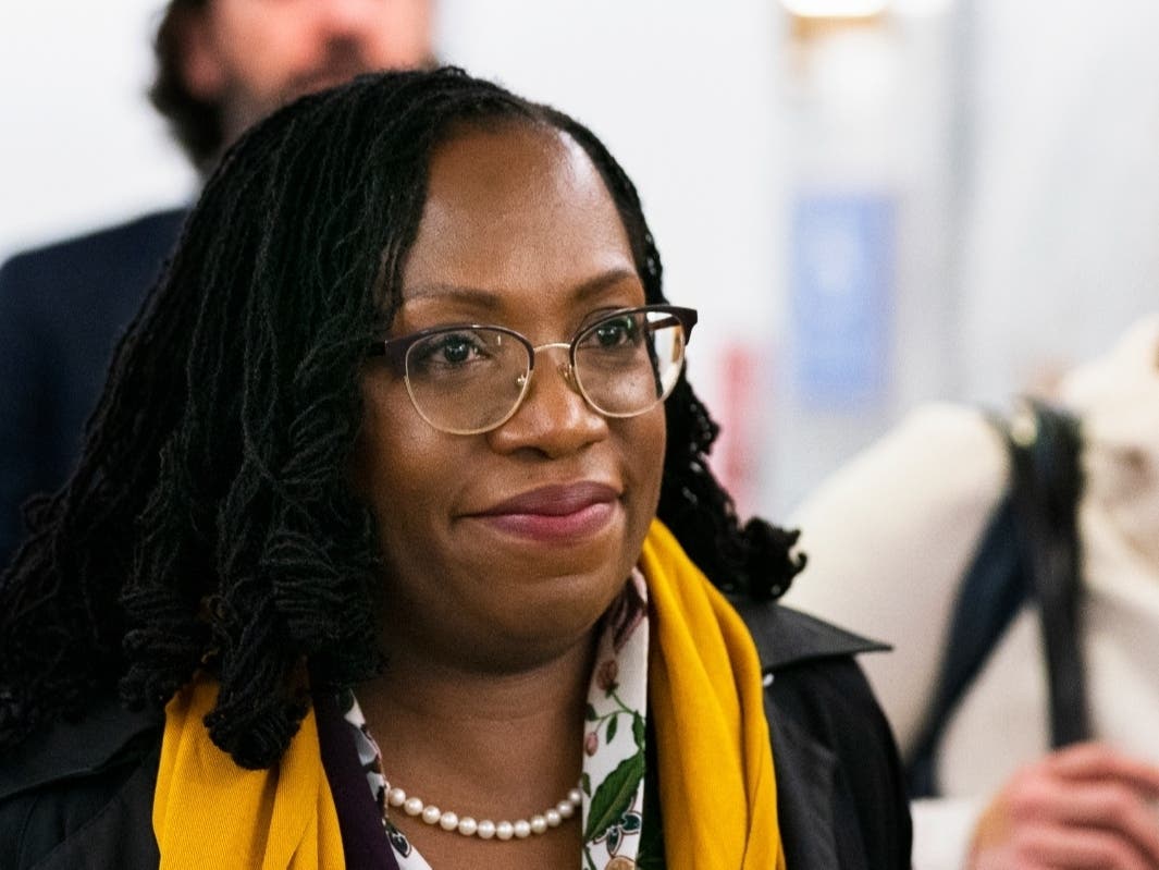 ​Supreme Court nominee Judge Ketanji Brown Jackson, pictured Monday walking to meet Democratic Sen. Mark Warner of Virginia on Capitol Hill, is expected to be confirmed this week as the first Black woman on the Supreme Court.