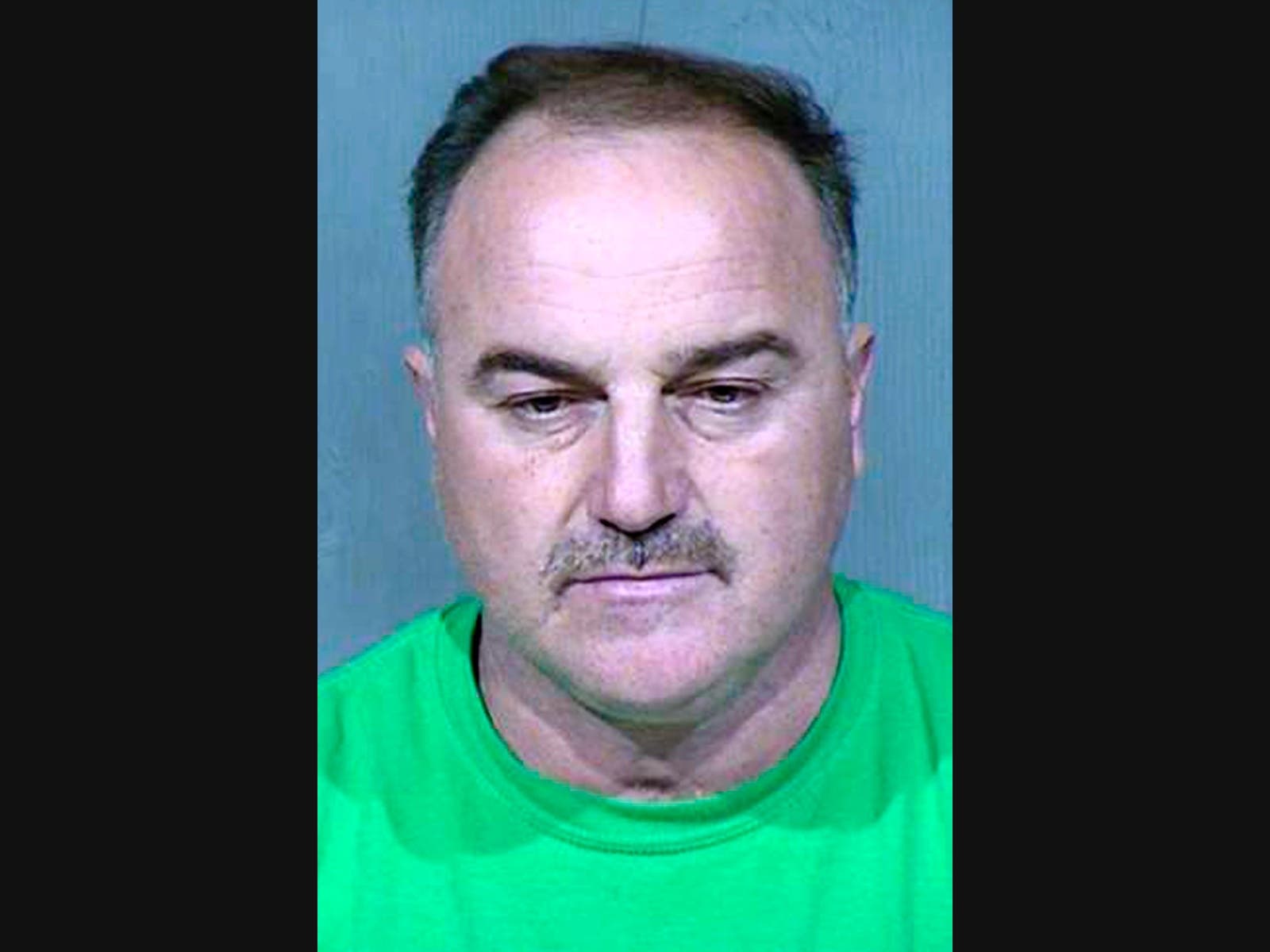 This undated booking photo provided by the Maricopa County Sheriff's Office shows Ali Yousif Ahmed Al-Nouri, who was arrested in January 2020 in Arizona as part of an extradition request made by the Iraqi government. 