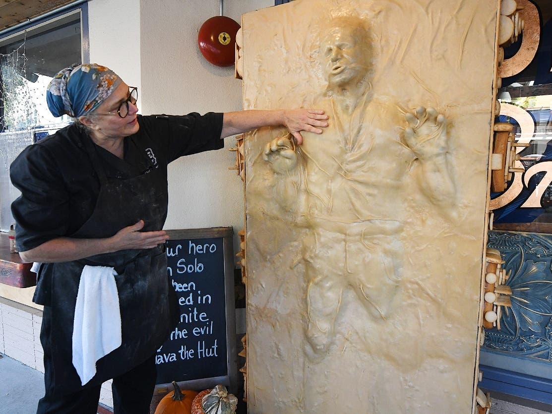 Catherine Pervan, with Our House Bakery in Benicia, Calif., talks about creating the life-sized Han Solo on Oct. 13, 2022 The piece is the bakery's entry in the downtown Benicia scarecrow contest. 

