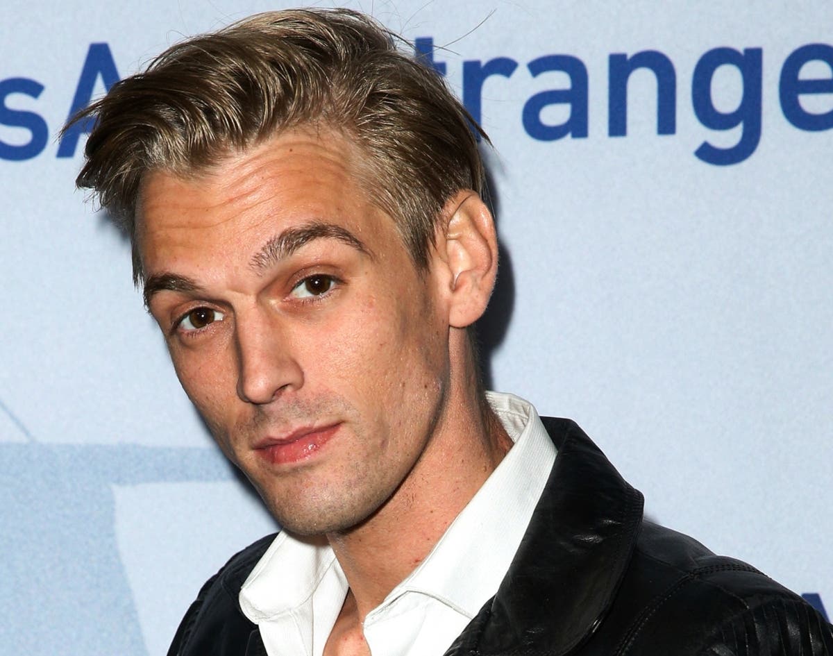 Singer Aaron Carter arrives at a premiere of "Saints & Strangers" at the Saban Theater in Beverly Hills in 2015. Carter, the singer-rapper who began performing as a child and had hit albums starting in his teen years, was found dead Saturday.