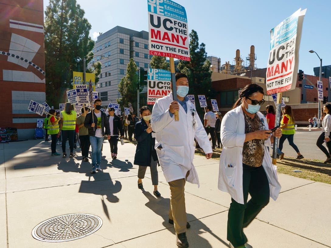 People participate in a protest outside the UCLA campus in Los Angeles, Monday, Nov. 14, 2022. 