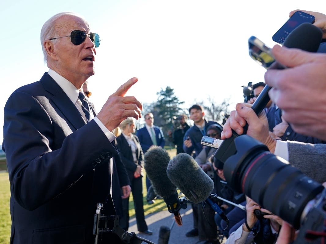 President Joe Biden talks with reporters on the South Lawn of the White House in Washington, D.C., Monday after returning from an event in Baltimore on infrastructure. 