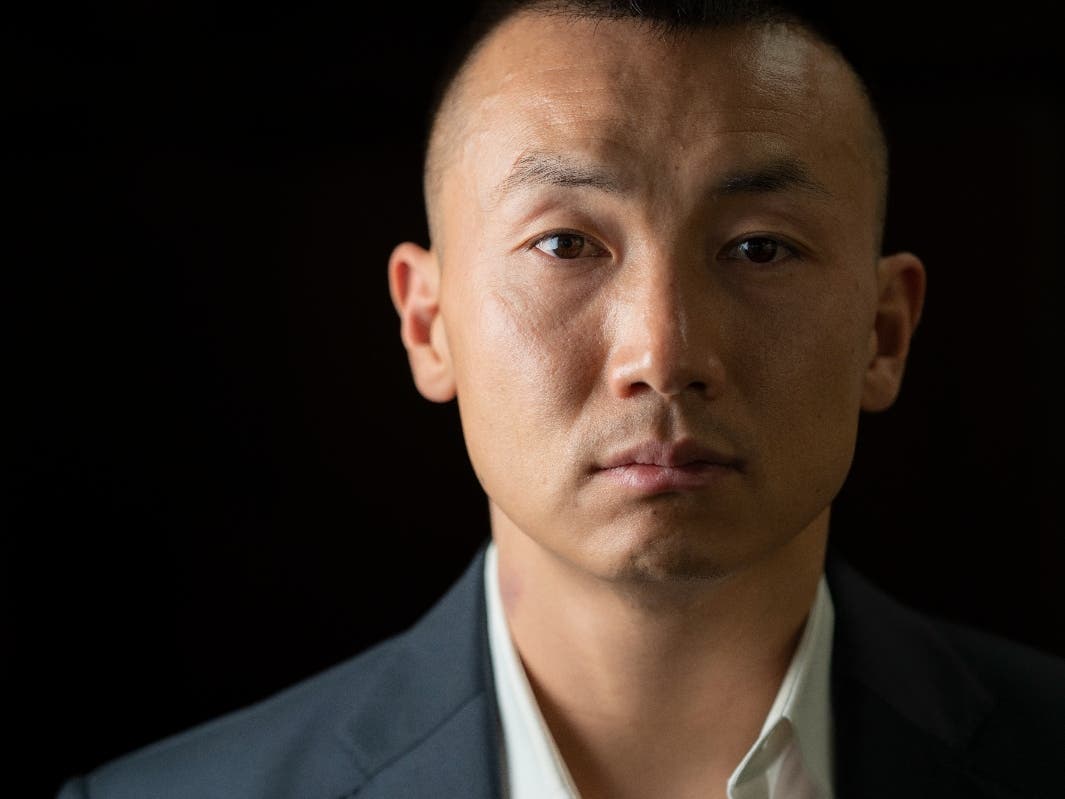 Baimadajie Angwang is photographed at the Law Office of John F. Carman, Esq., after an interview with the Associated Press, Wednesday, Feb. 1, 2023, in Garden City, N.Y. 