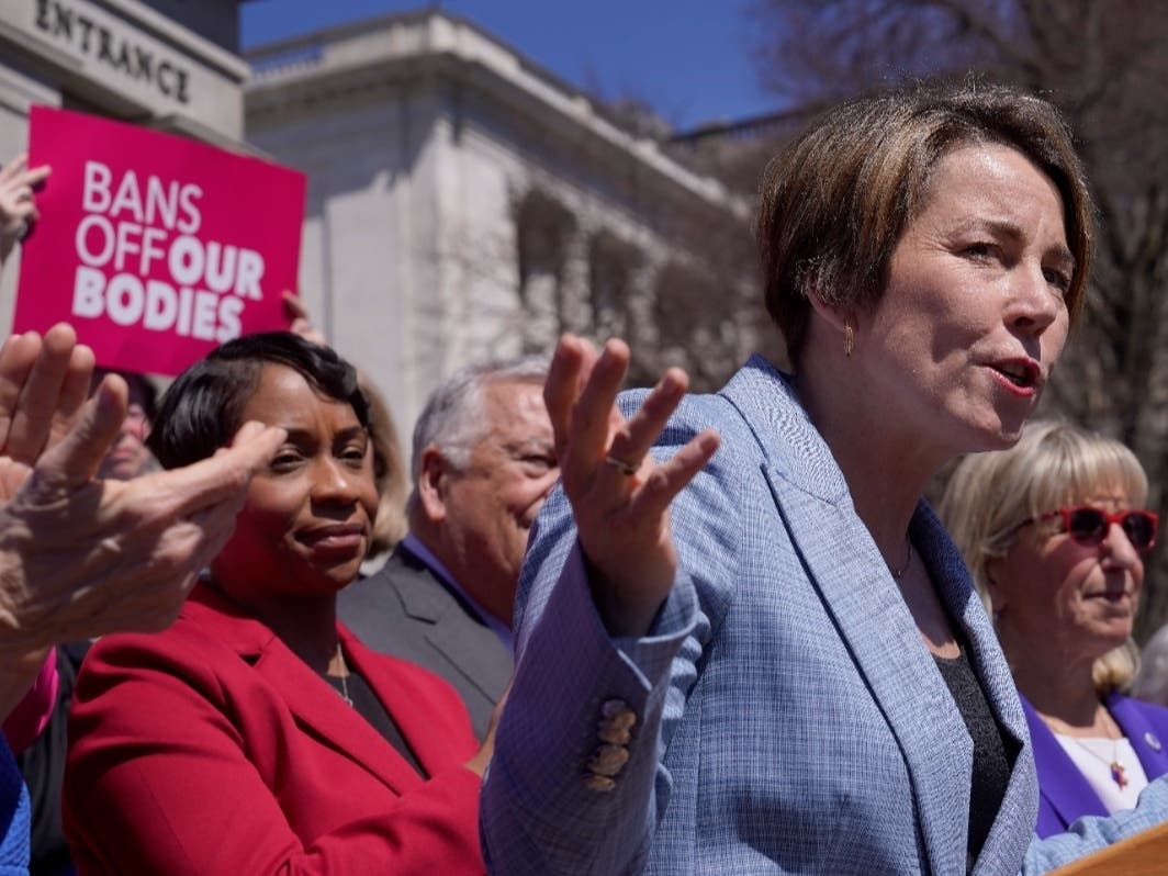Massachusetts Gov. Maura Healey, front right, faces reporters as state Attorney General Andrea Campbell, left, looks on Monday during a news conference in front of the Statehouse in Boston. Healey said a state stockpile of mifepristone will last a year.