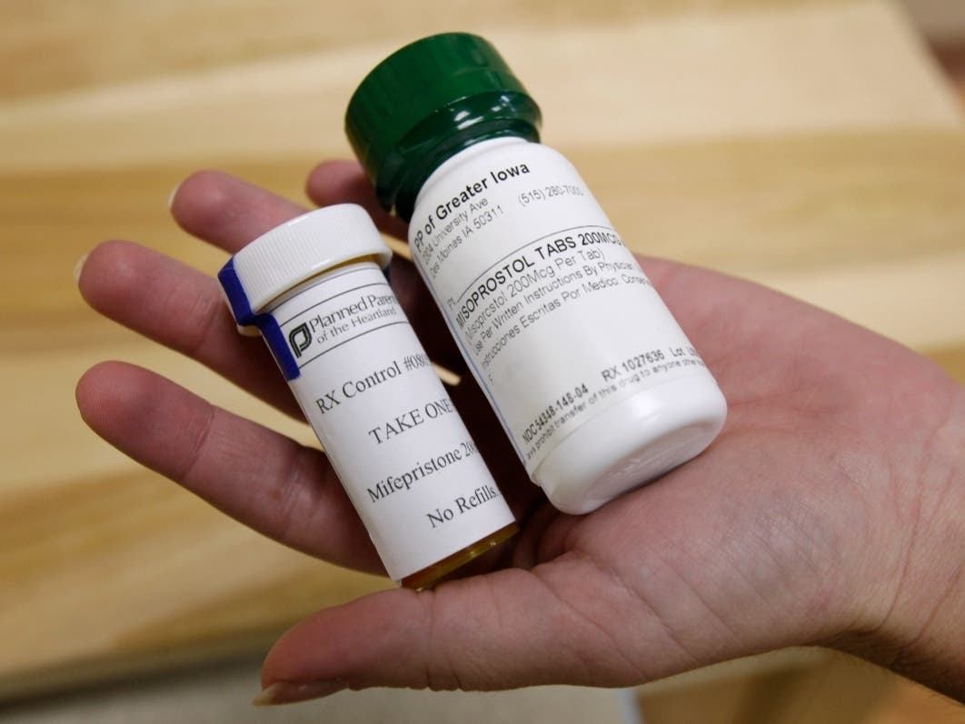 A federal appeals court has preserved access to an abortion drug for now but under tighter rules that would allow the drug only to be dispensed up to seven weeks, not 10, and not by mail.