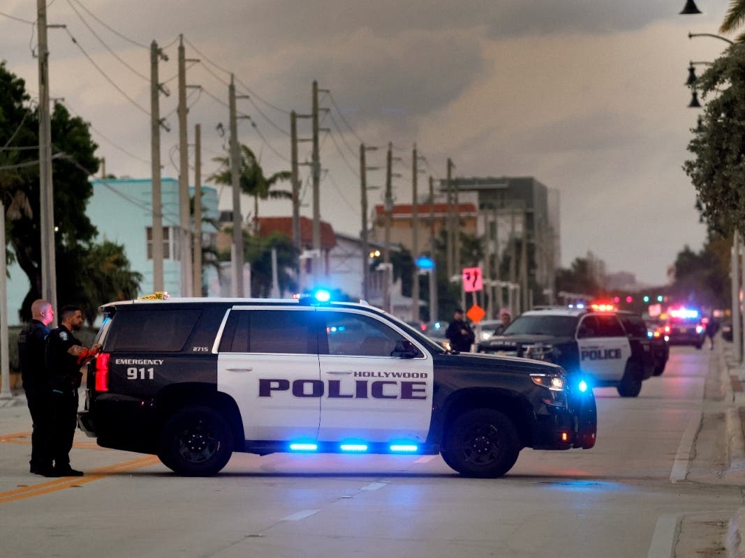 Police investigate a shooting near Hollywood Beach Monday in Hollywood, Florida. 